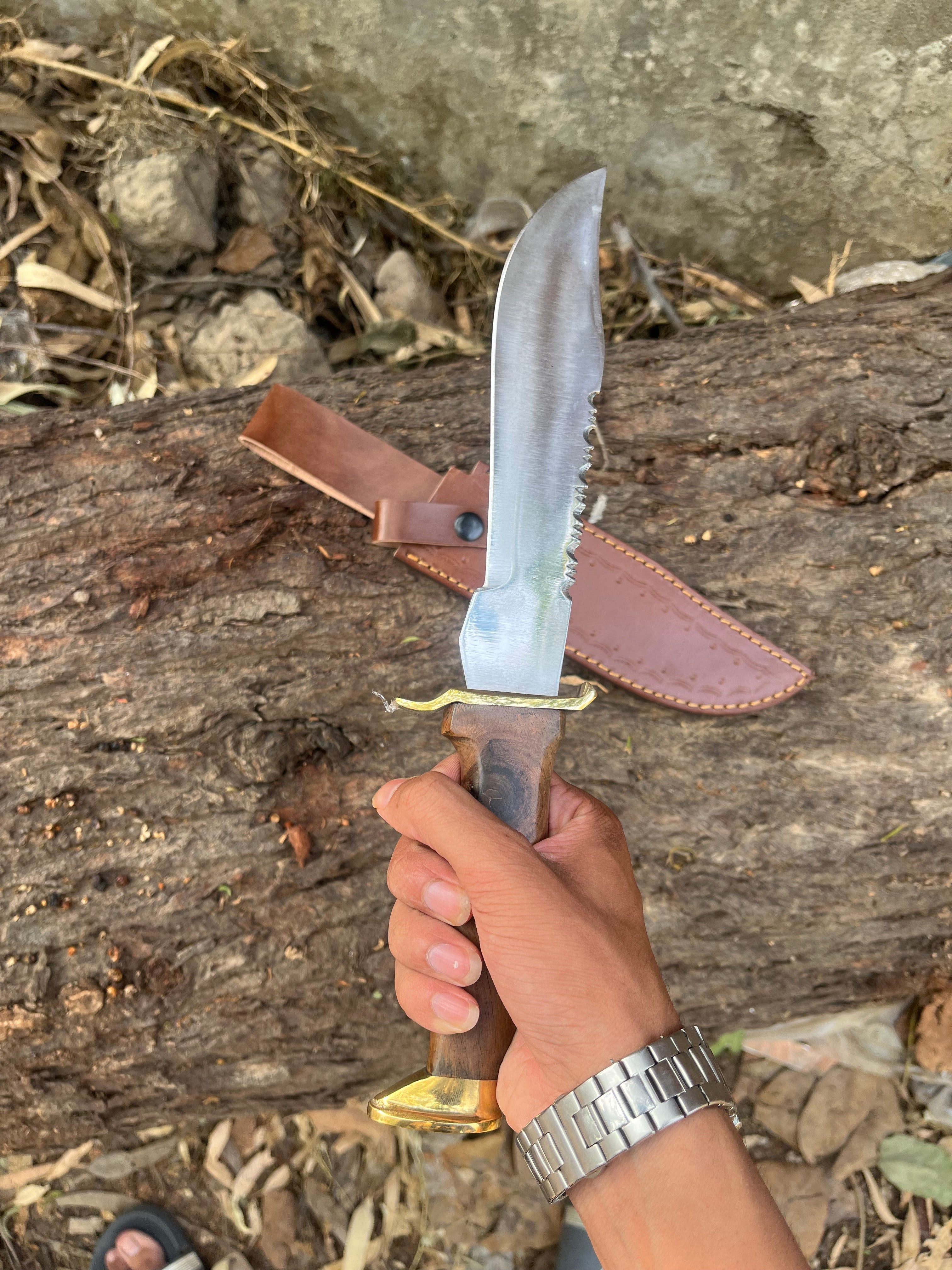 Handmade hunting knife with leather cover