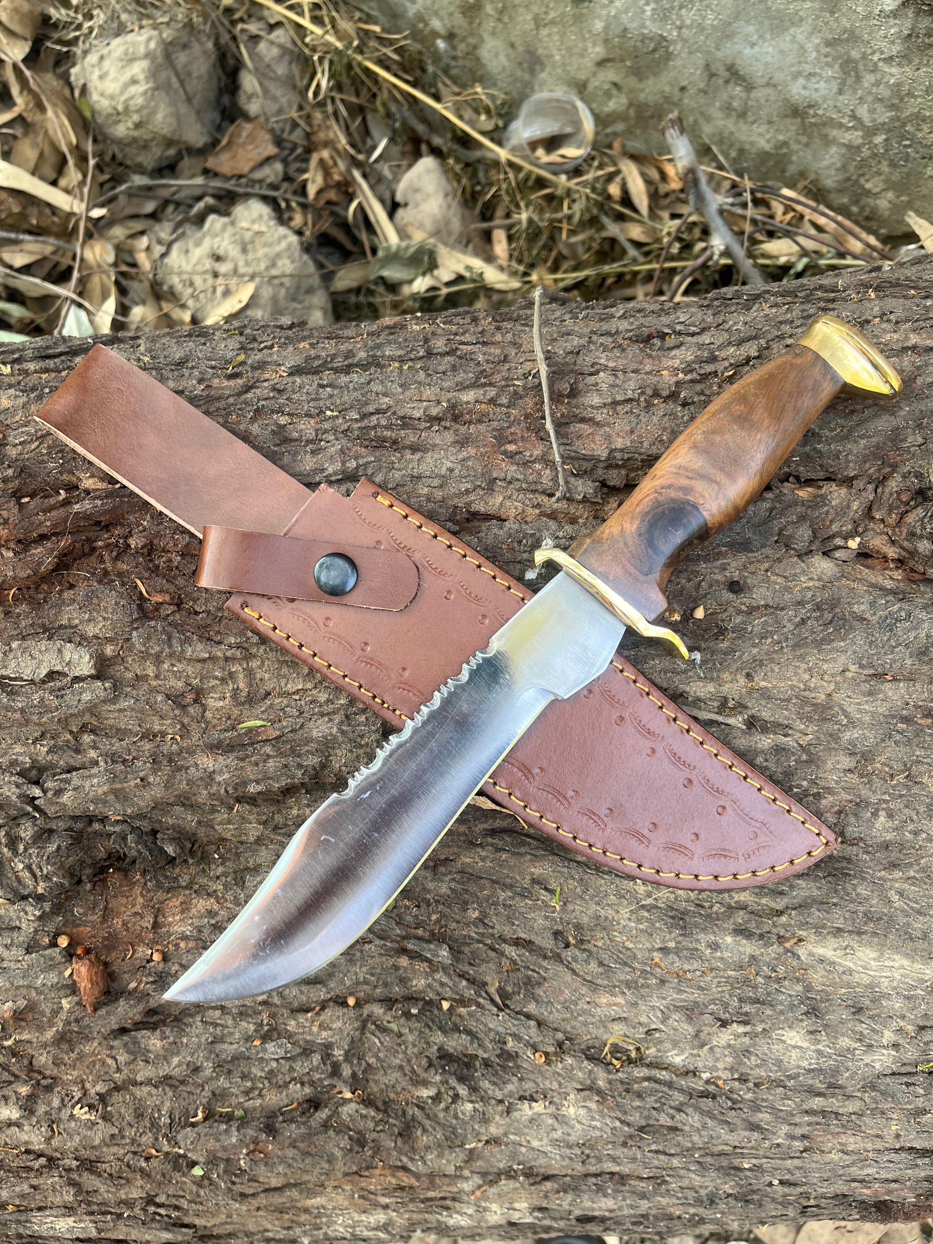 Handmade hunting knife with leather cover